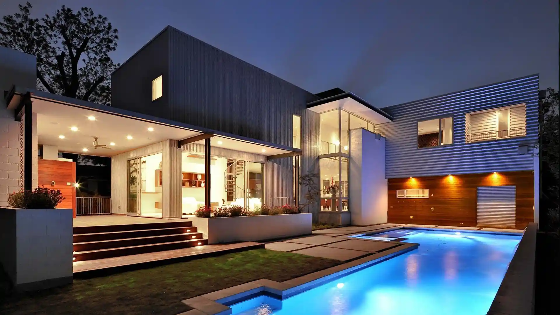 Modern residential construction by a local construction company featuring a pool and stylish design elements.